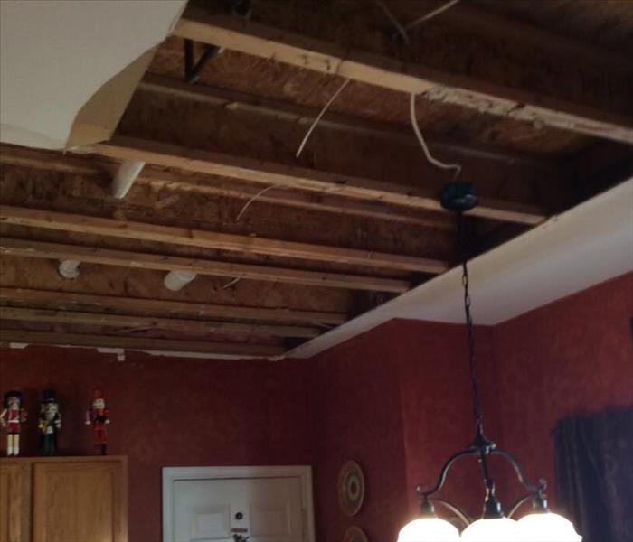 ceiling removed from kitchen area after water damage