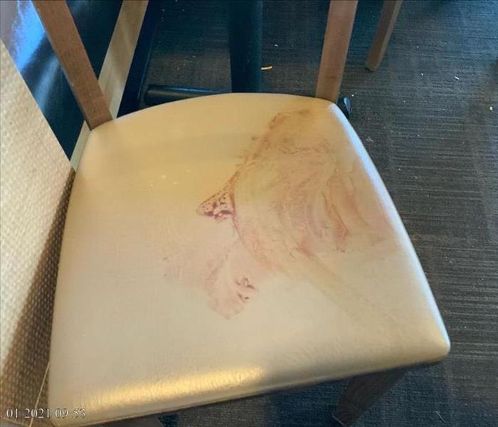 Chair with biohazard stain from Restaurant 