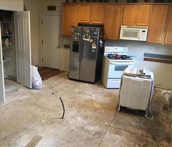Kitchen after water damage has been removed