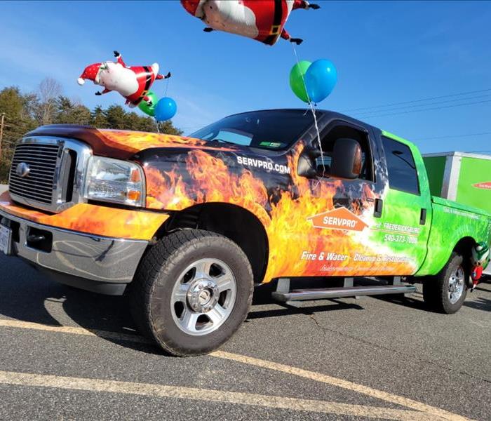 Christmas parade decorated truck and trailer for SERVPRO 
