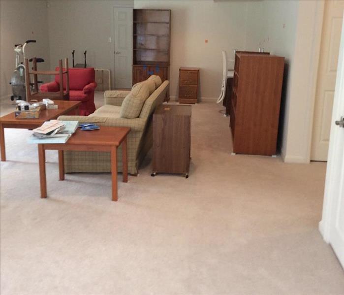 Living room with cleaned tan carpets by SERVPRO of Fredericksburg